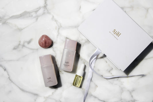 Receive a complimentary Rose Gold Cleansing Revitalizing Set from Själ Skincare.